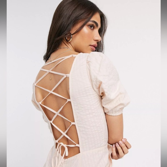 ASOS DESIGN Seersucker Lace Up Back Jumpsuit In Blush - Picture 5 of 14